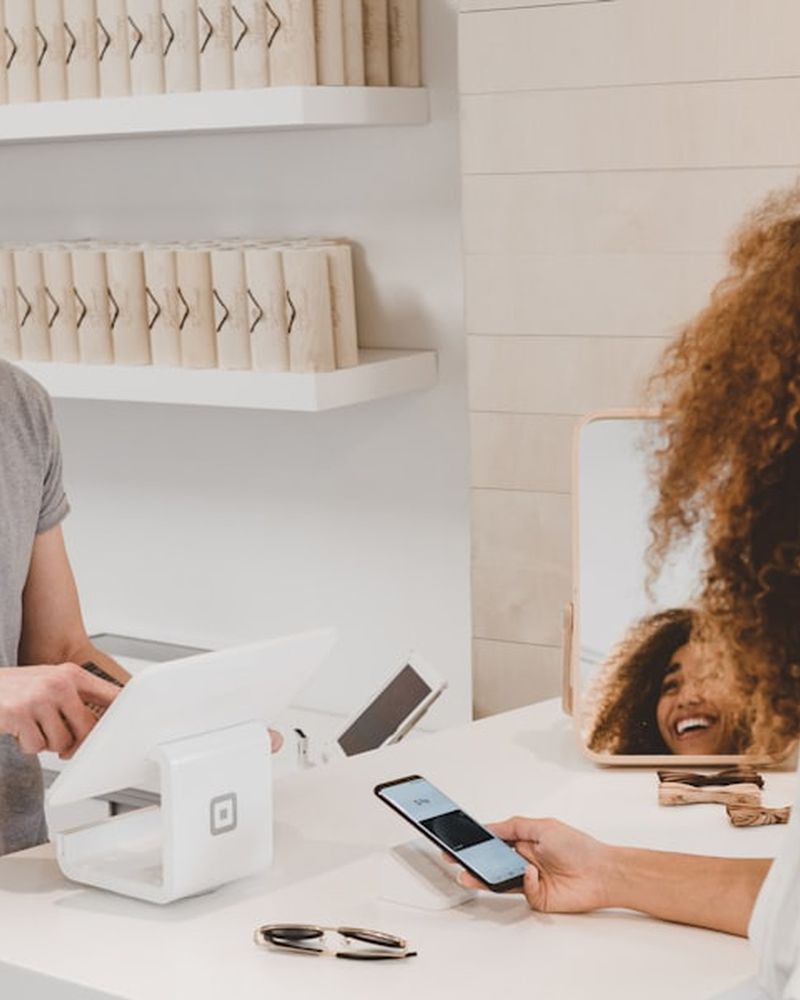 Card payment being taken at a retail counter