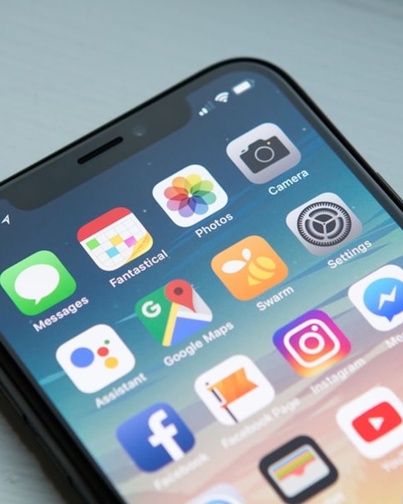 Smartphone home screen full of apps
