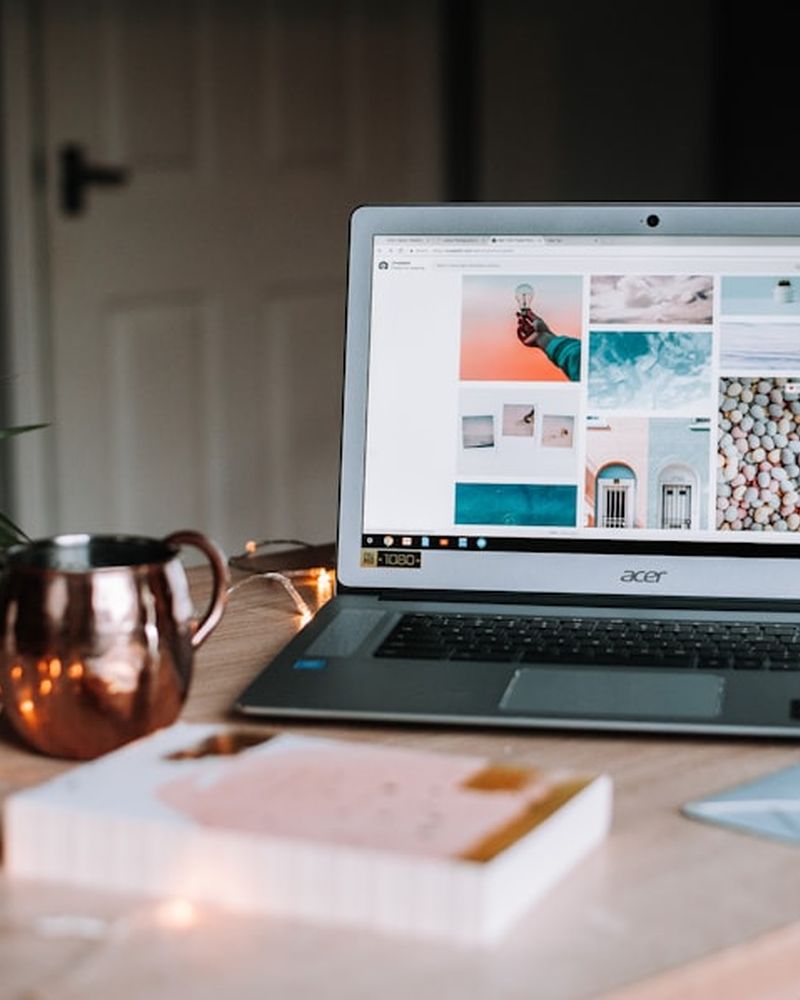 Website open on a laptop at a desk